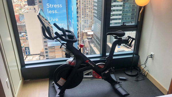 A Peloton bike is the centerpiece of the Wellness Rooms at the Tempo by Hilton Times Square.