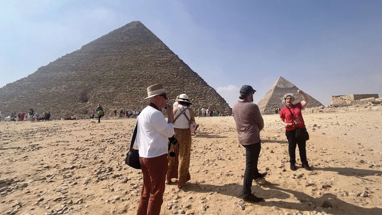 Egyptologist and Viking tour guide Heba gives a history lesson on the Great Pyramid of Giza to the press group that was in Egypt for the Viking Aton naming ceremony.